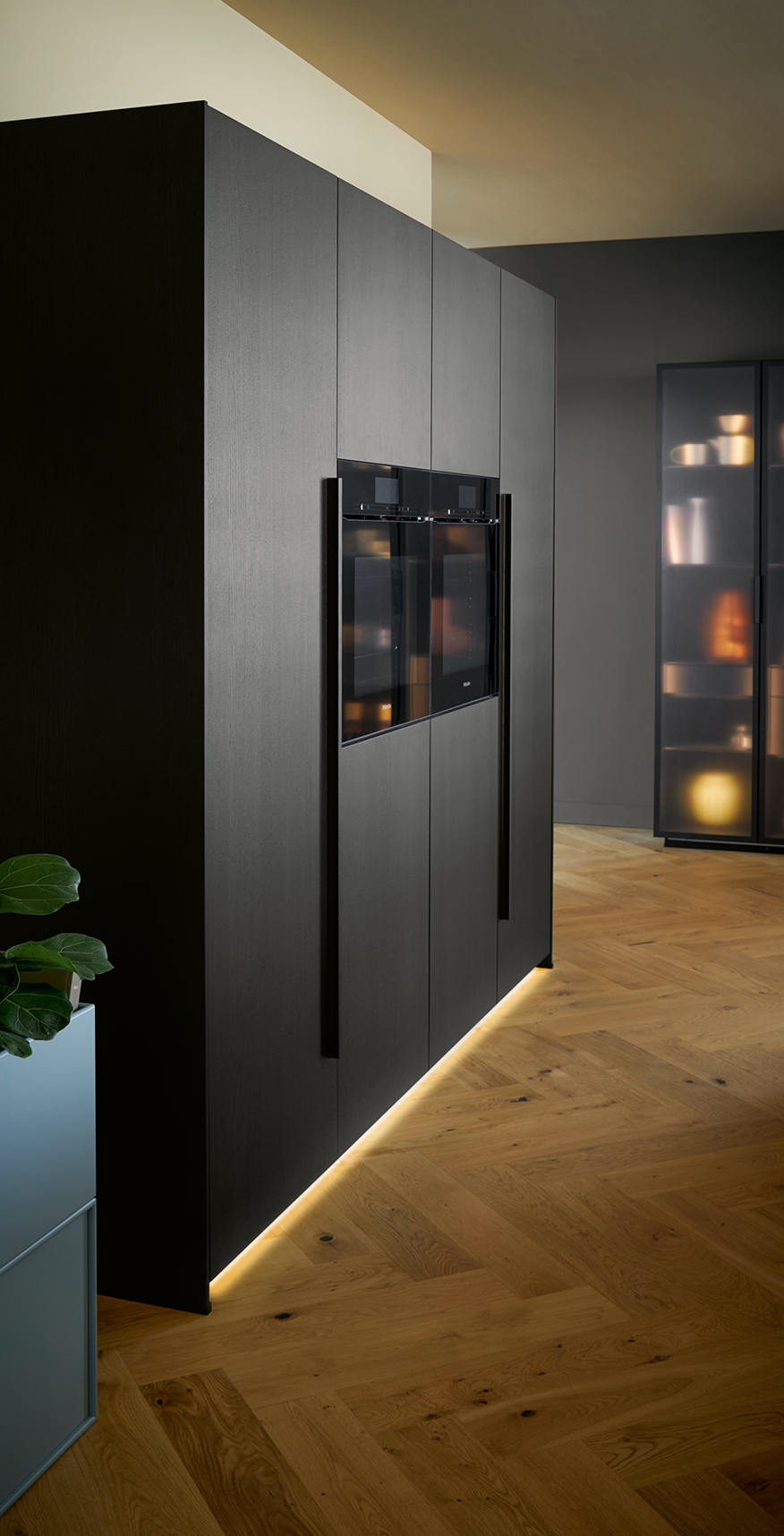 Black kitchen cabinets and oven
