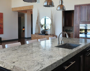 White Worktop with Cream and Black Contrast with Polished Finish