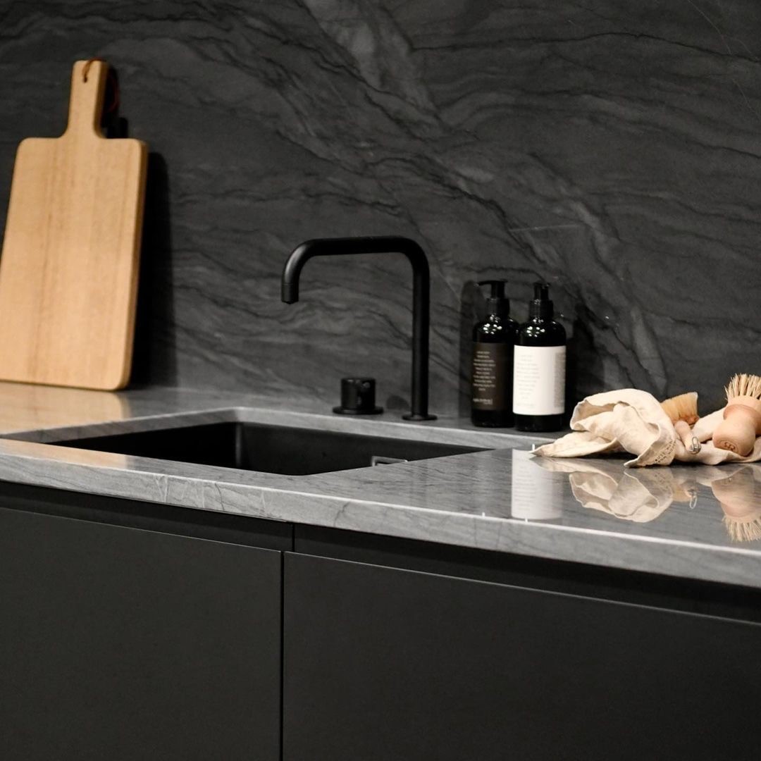 Black Kitchen Worktop on the Back of the Sink